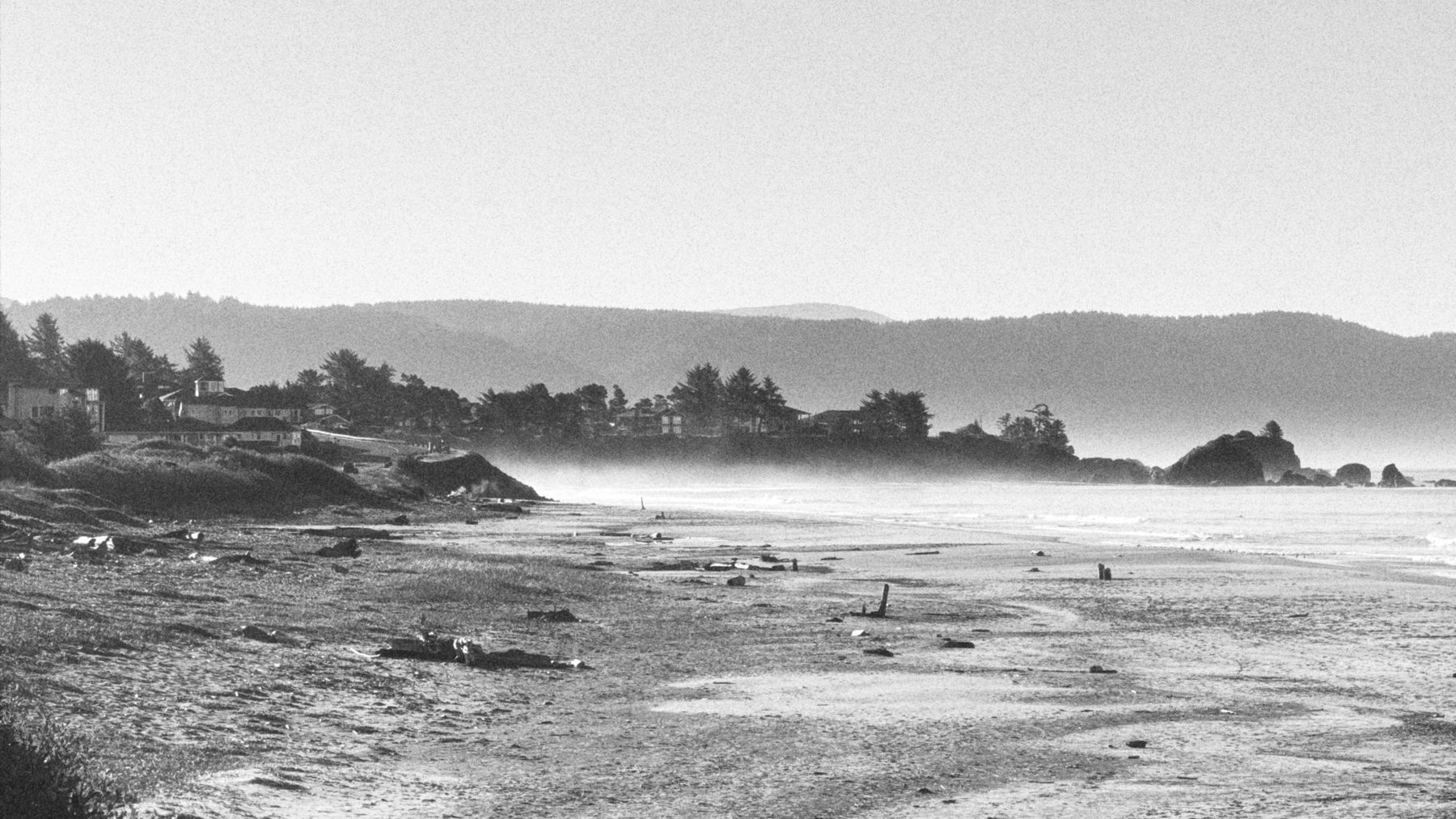 Fog over the beach and headland